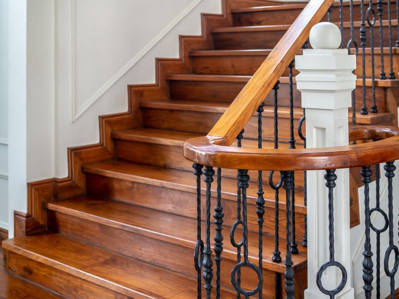 Elegant Staircase with Refinished Bannister